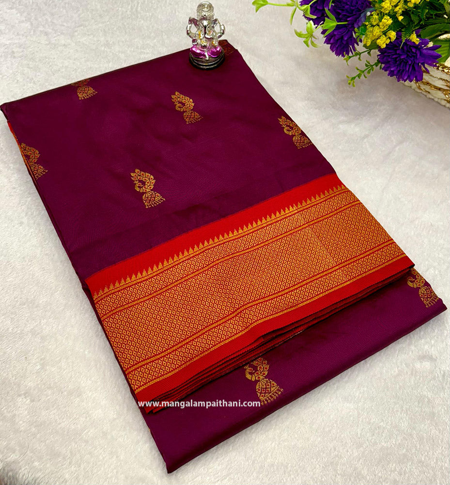 A Paithani saree with a rich zari work pallu and a contrast weaved designer blouse