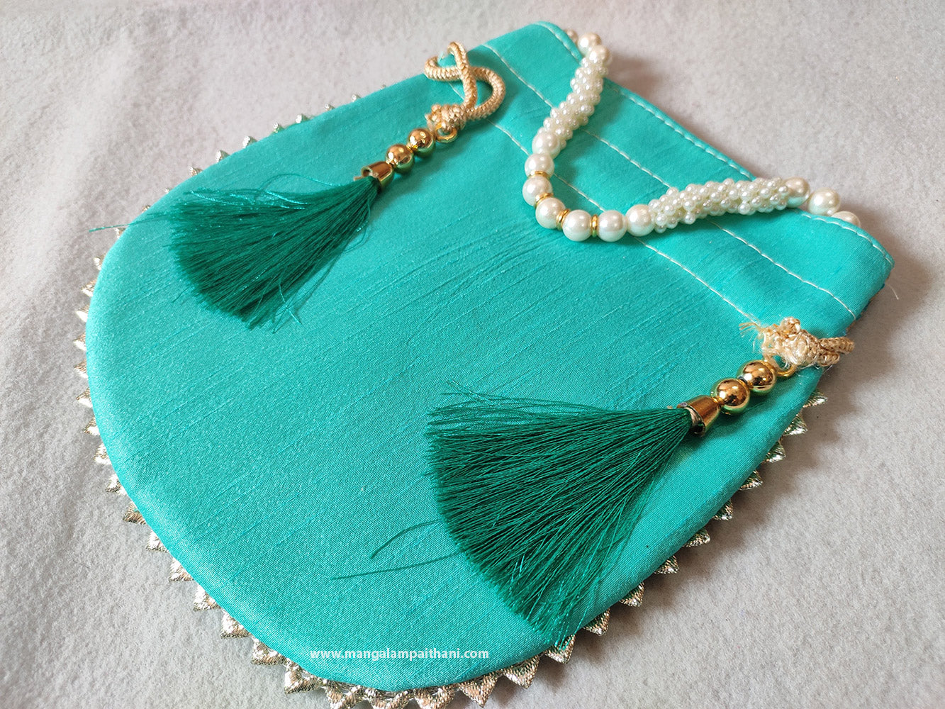blue paithani pouch