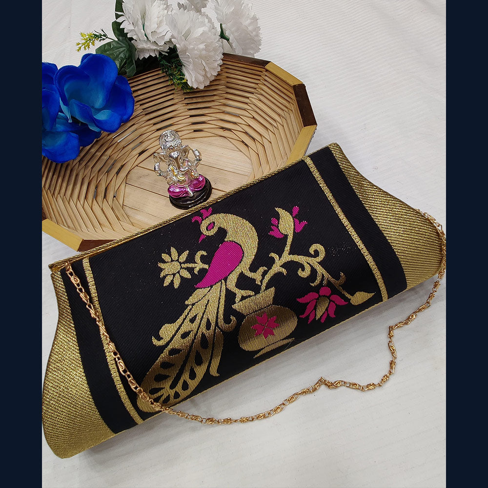 A black and gold clutch purse