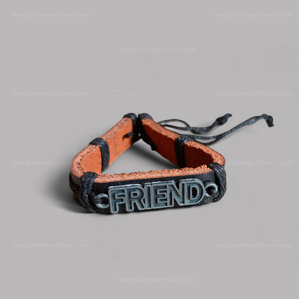 Leather bracelet with 'FRIEND' charm on a gray background